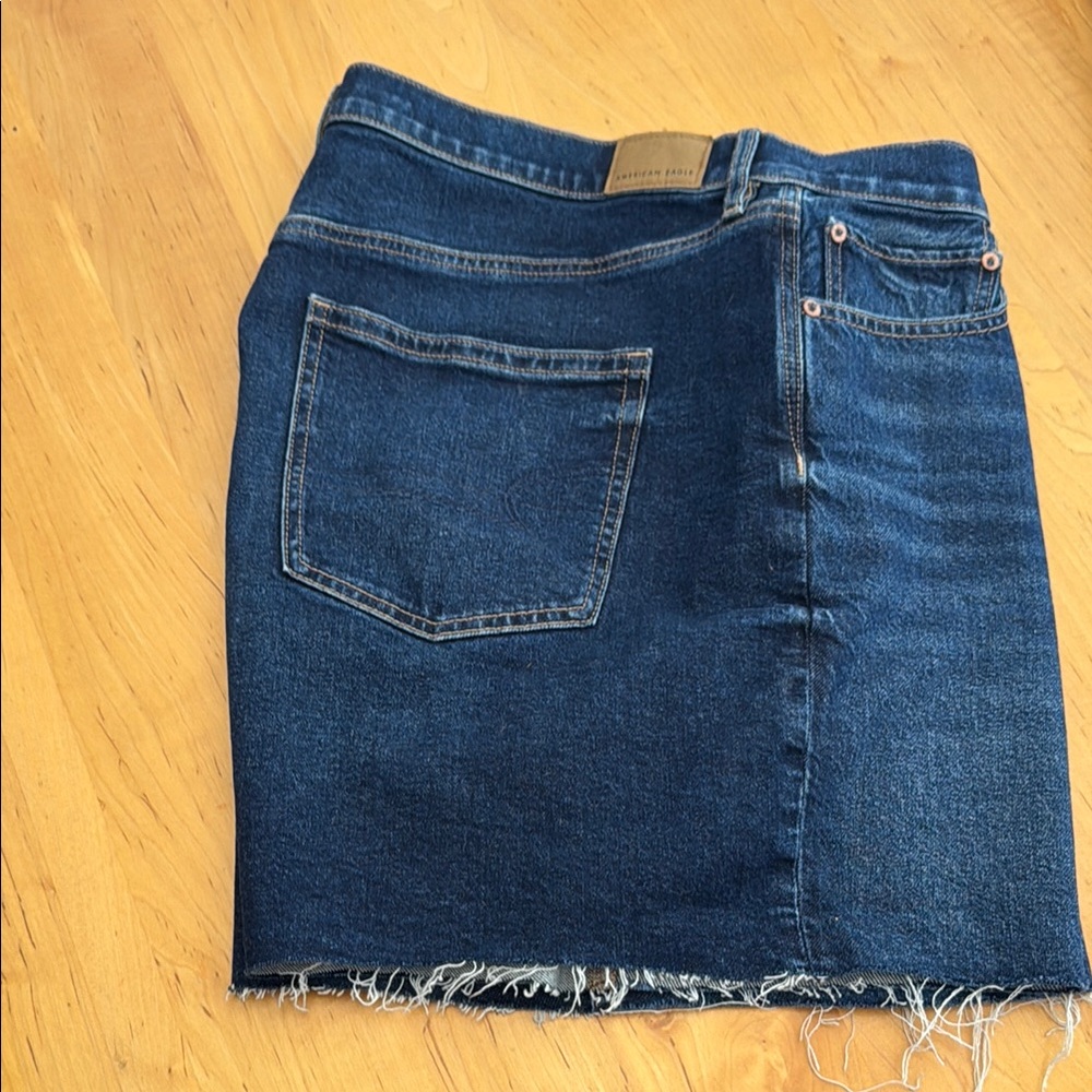 Denim Bermuda shorts with Frayed Hem
